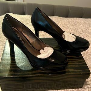 Black round toe pumps
